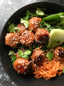 Sticky BBQ meatballs with Asian Greens