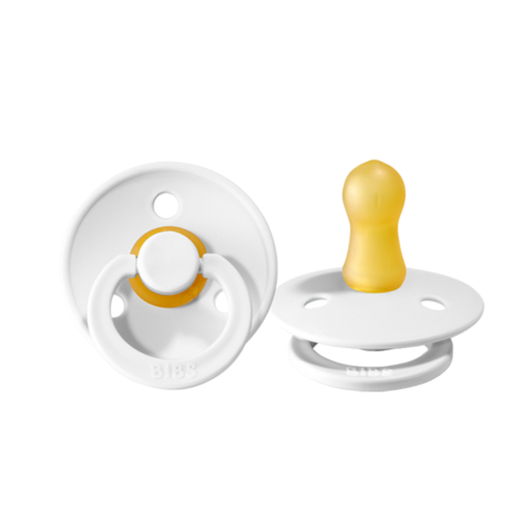 Pair of BIBS Dummies Size 1 in white with soft silicone nipples, designed for infants, shown in a close-up image.